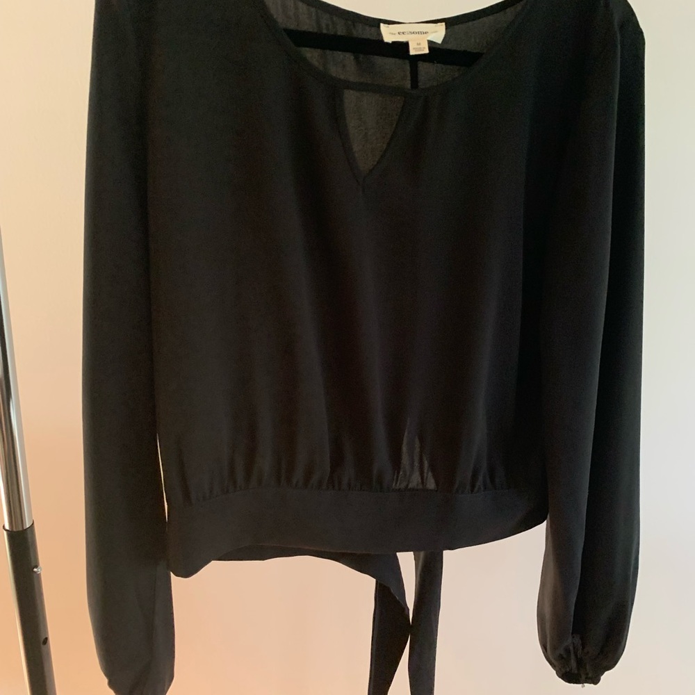 Black long sleeve going out top. NEVER WORN, no tags.